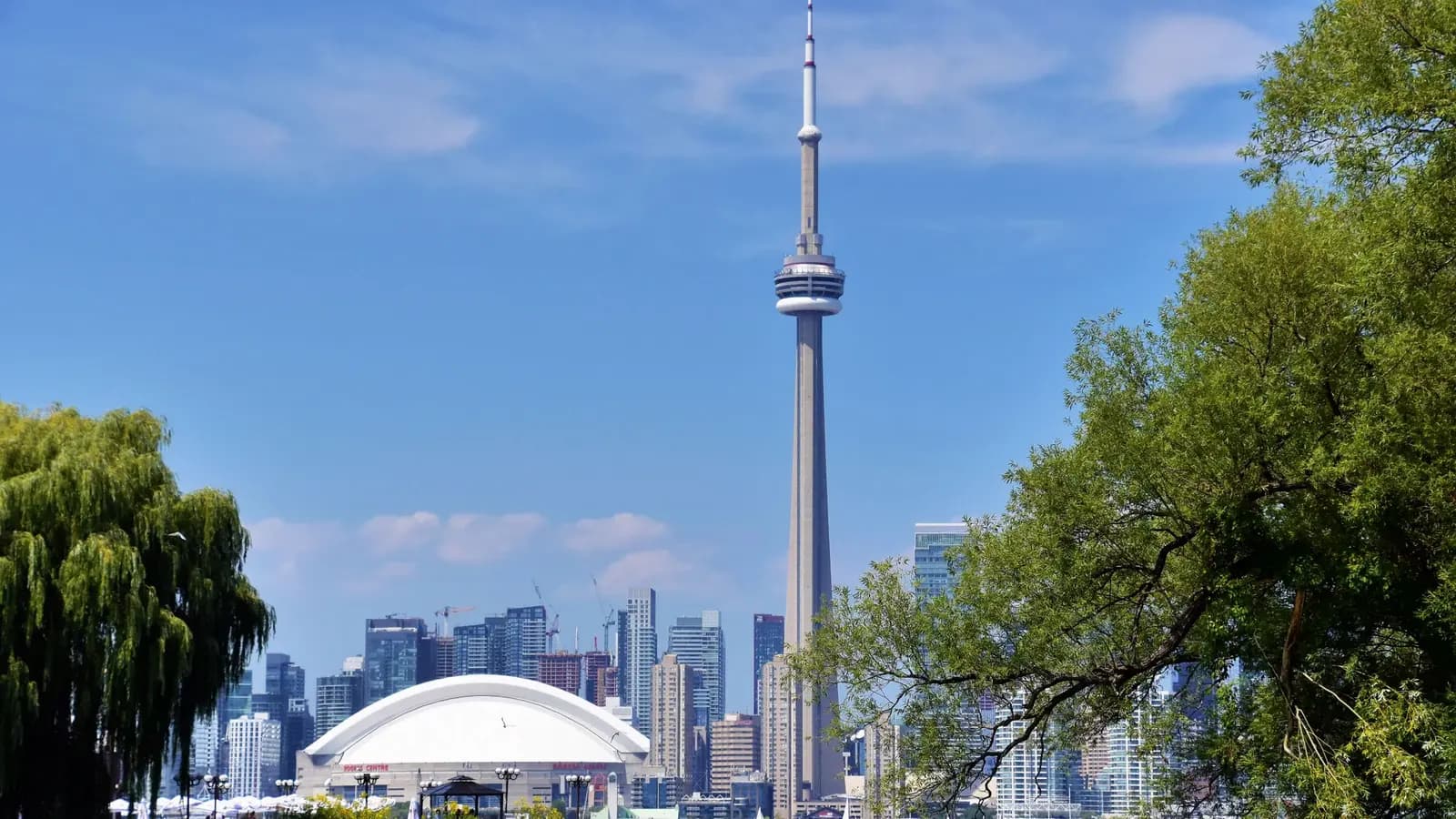 The CN Tower, Rogers Centre and the downtown Toronto skyline seen across Lake Ontario