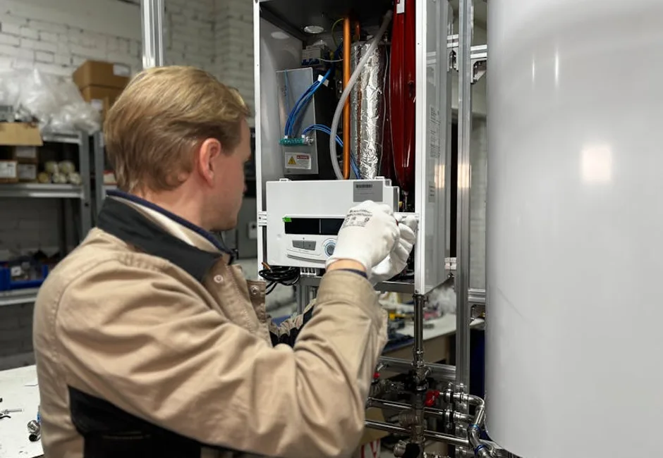 HVAC technician repairing a furnace heating system during an emergency service call in Toronto