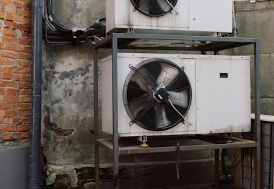 Water pooling around an indoor AC air handler in a Toronto basement