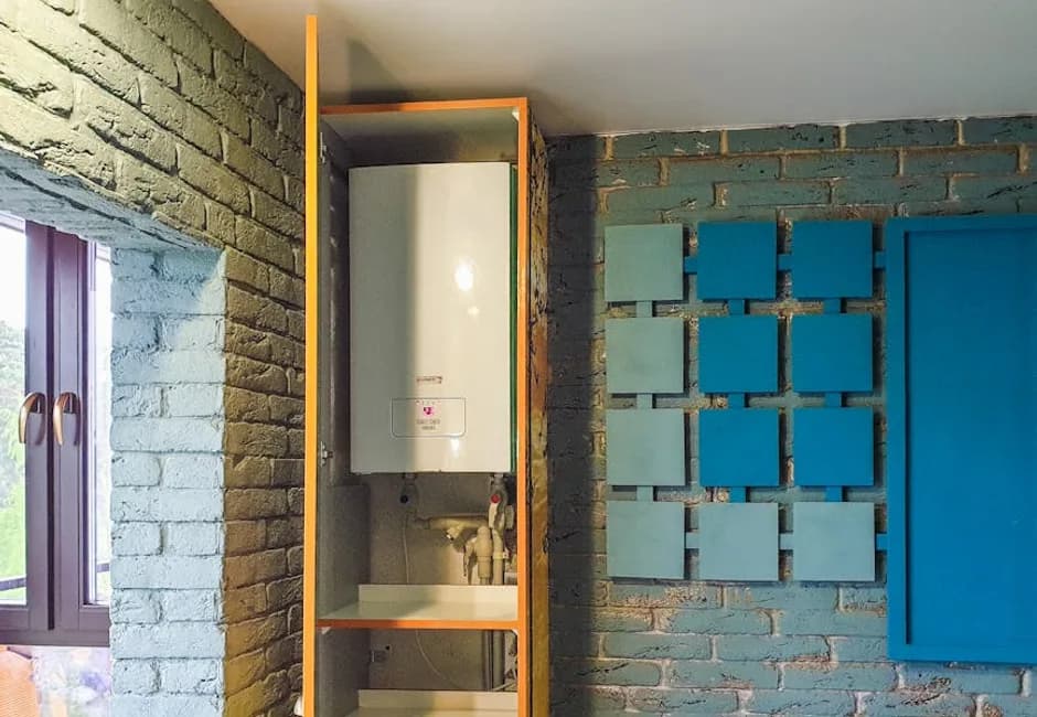 Wall-mounted high-efficiency gas furnace installed in a Toronto home mechanical room